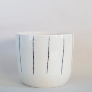 cup with black lines