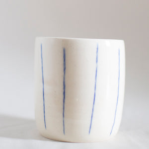 cup with blue lines