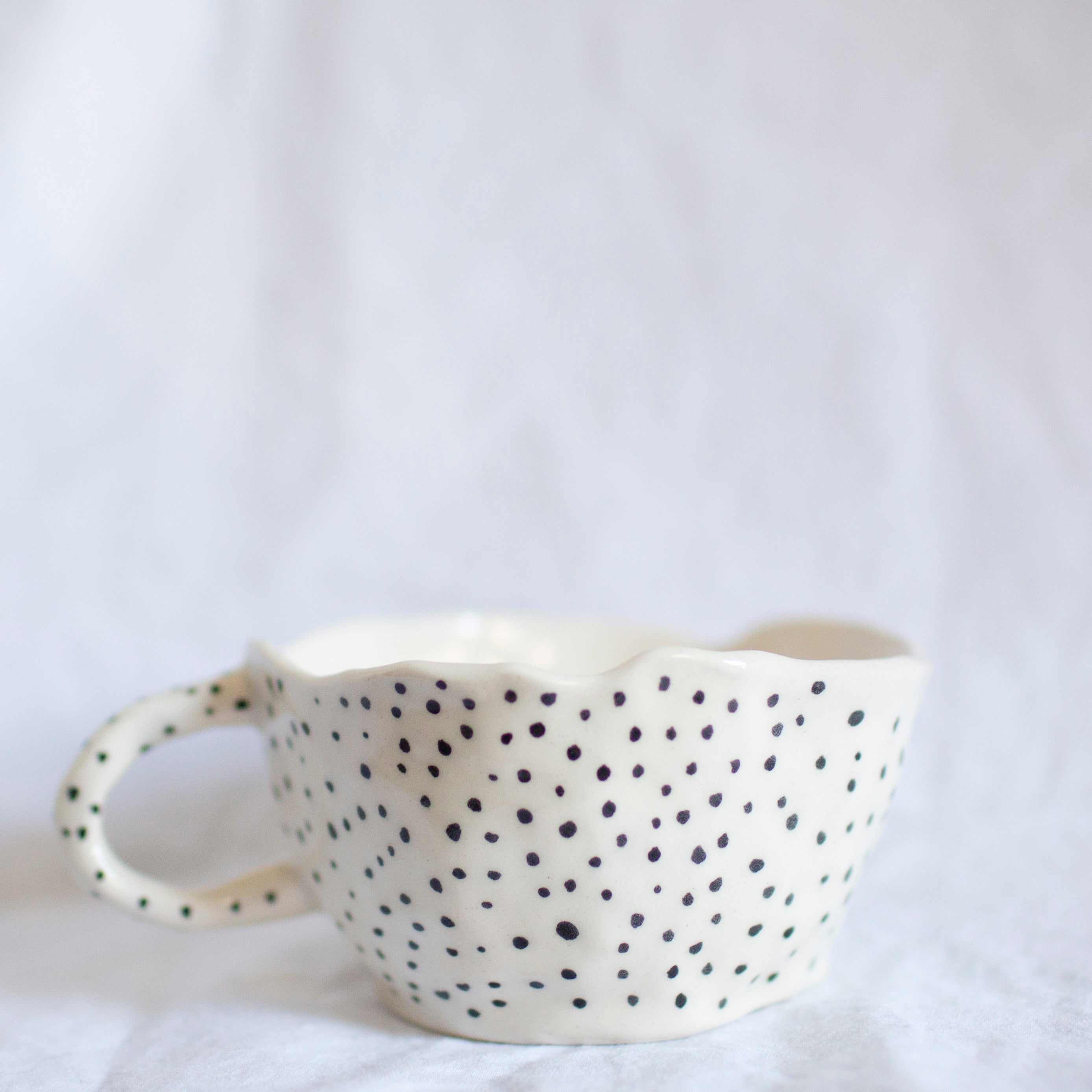 mug with black dots