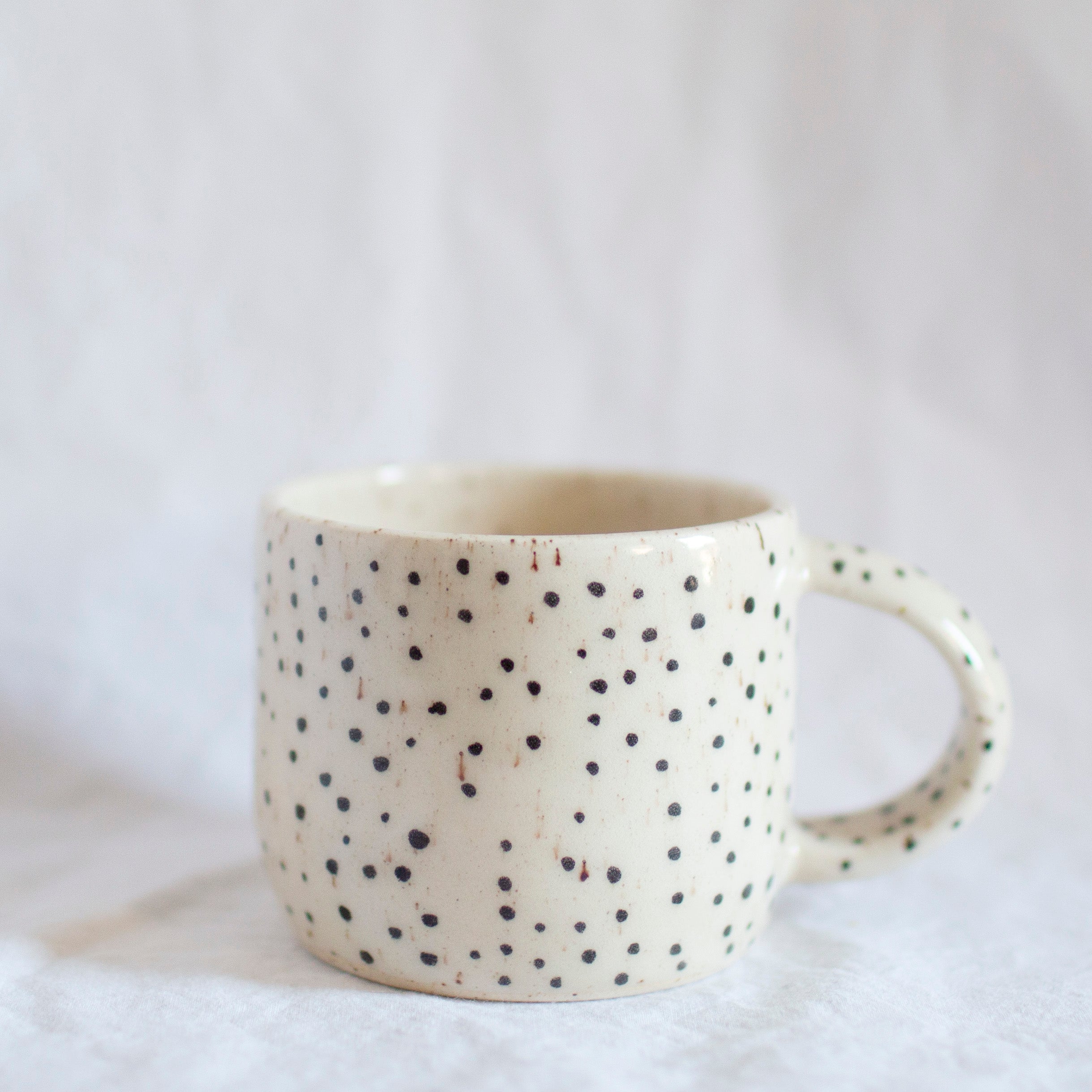 mug with black dots